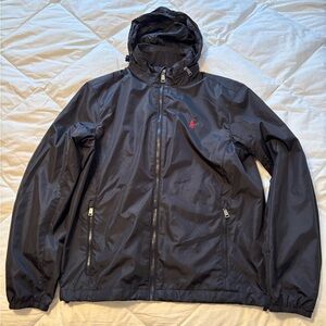 Ralph Lauren Black Windbreaker with Red Logo
NWT
Size Medium